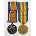 WW1 British War & Victory Medal Pair with Cap Badge & Button - Pte. T. Dewhurst, Devonshire Regiment