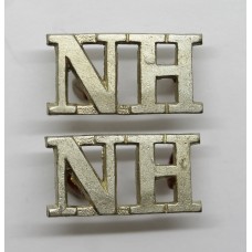 Pair of Northumberland Hussars (N.H.) Shoulder Titles