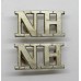 Pair of Northumberland Hussars (N.H.) Shoulder Titles