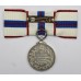 1977 Queen Elizabeth II Silver Jubilee Medal with Ladies Issue Bow Ribbon