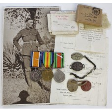 WW1 British War Medal, Victory Medal and WW2 Defence Medal with Dog Tags, Identity Bracelet and Boxes of Issue - Gnr. A.V. Bolam, Royal Artillery