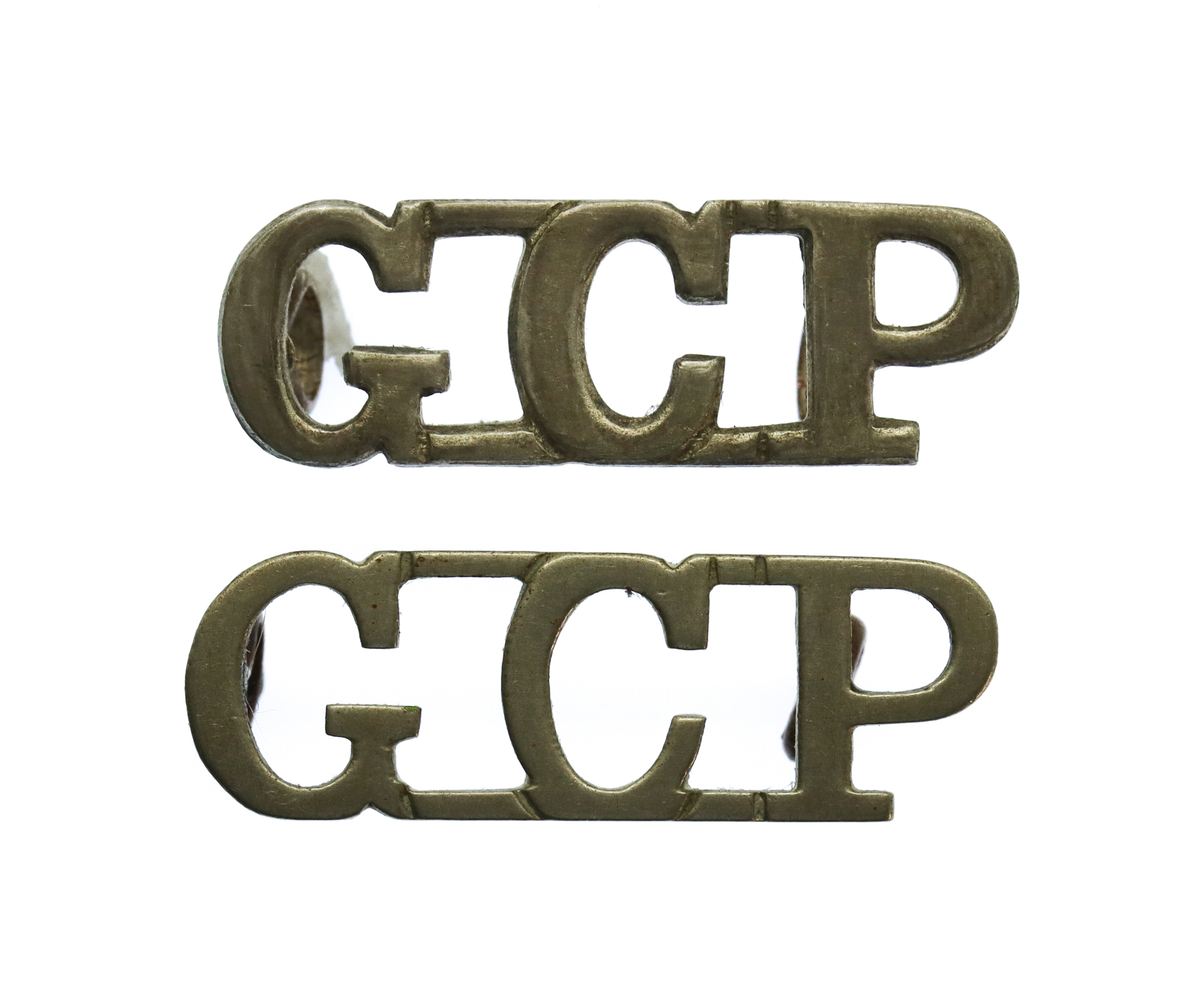 Pair of Gold Coast Police (GCP) White Metal Shoulder Titles