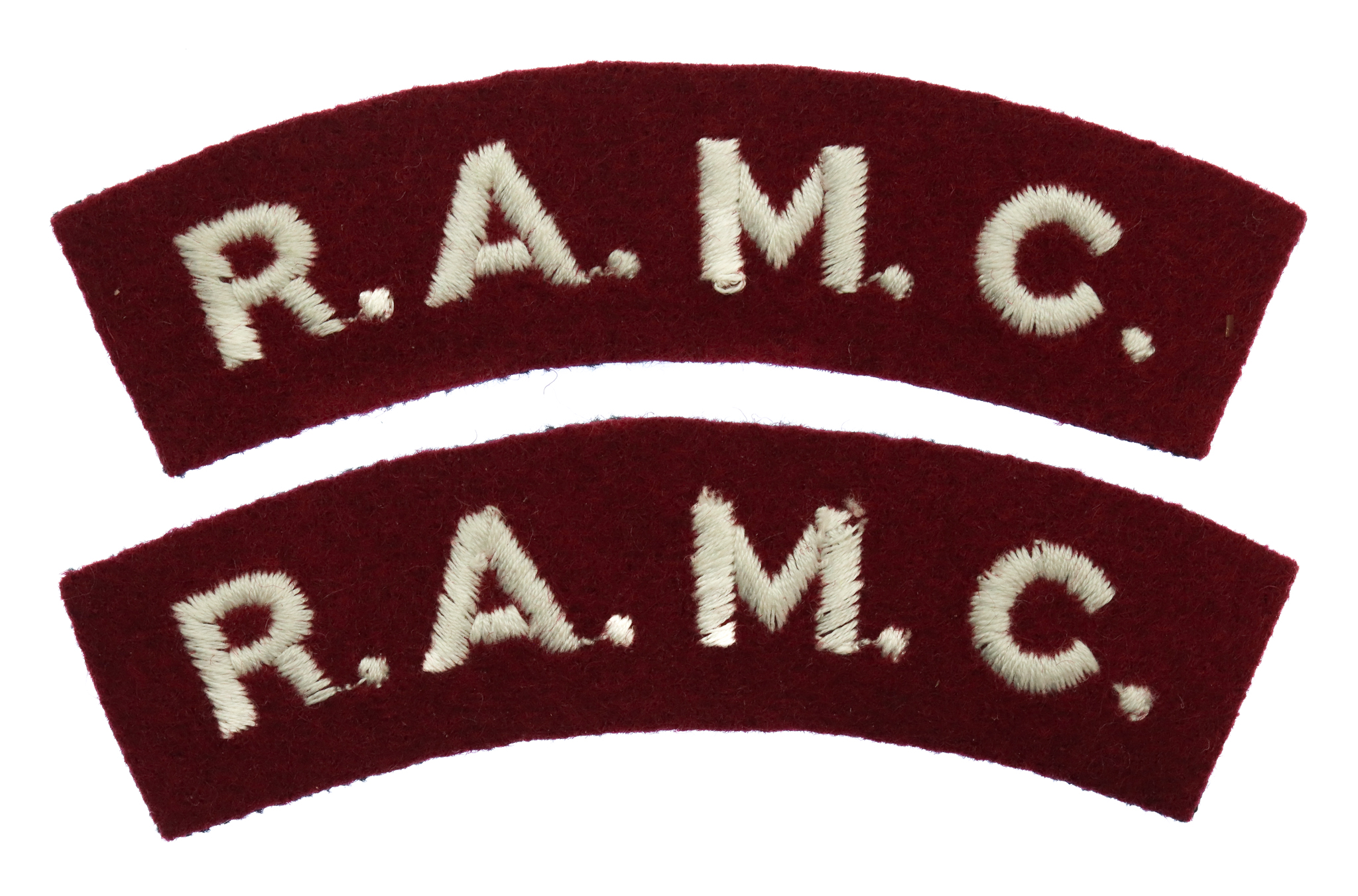 Pair of Royal Army Medical Corps (R.A.M.C.) Cloth Shoulder Titles