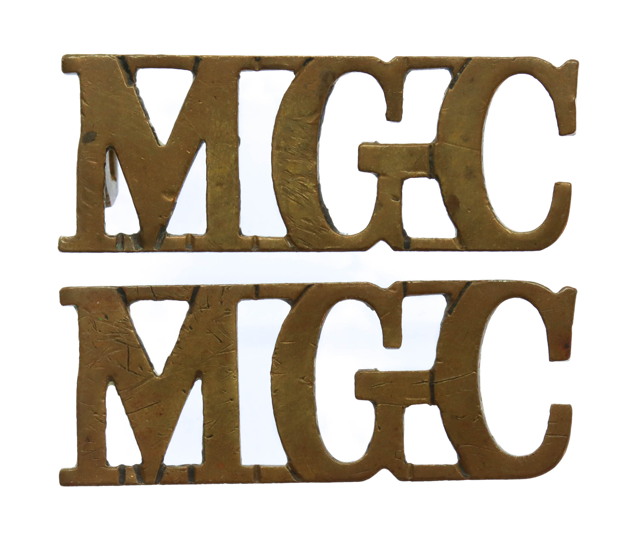 Pair of Machine Gun Corps (MGC) Shoulder Titles