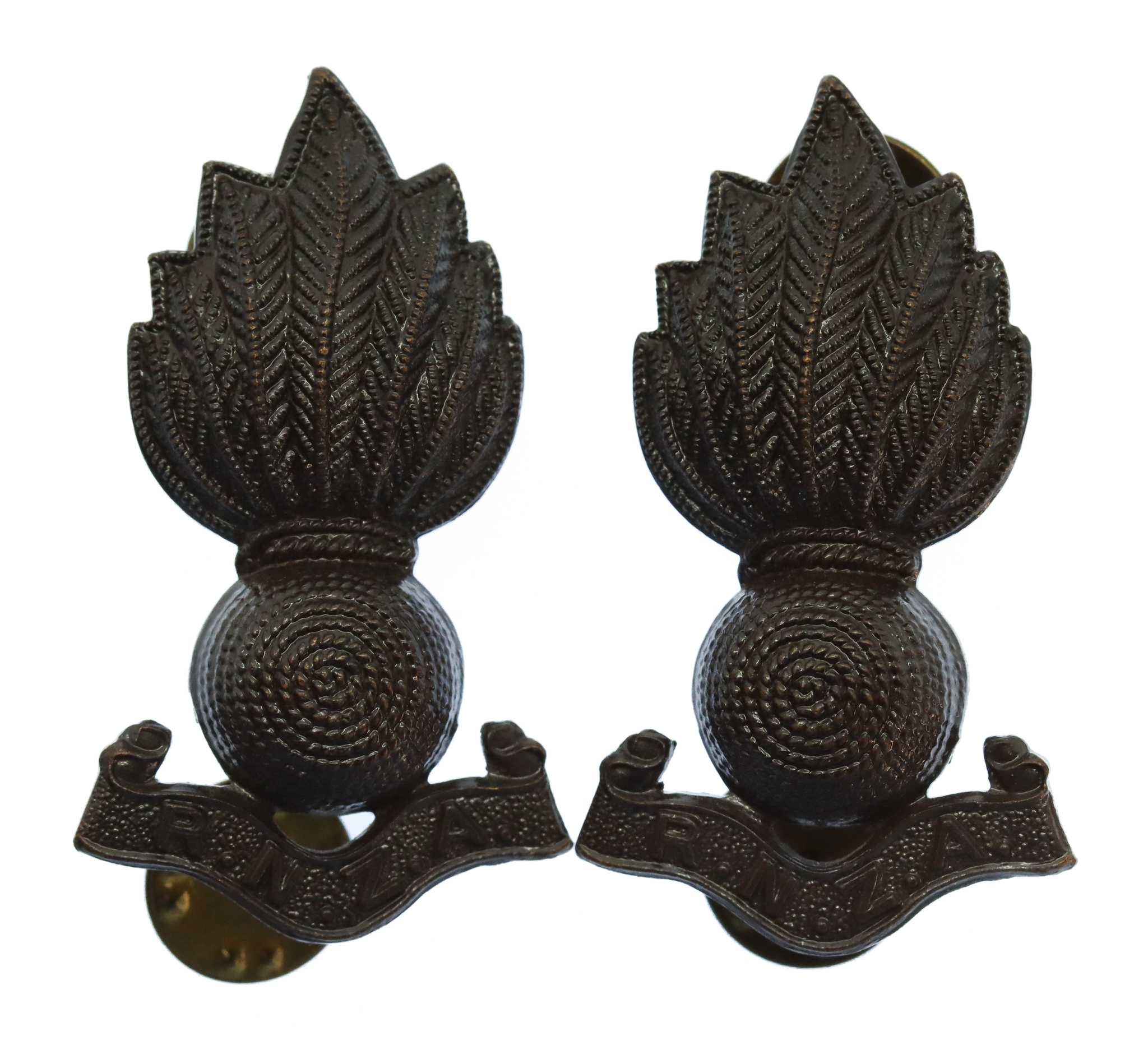 Pair of Royal New Zealand Artillery Collar Badges