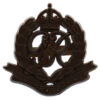 Corps of Military Police WW2  Plastic Economy Cap Badge