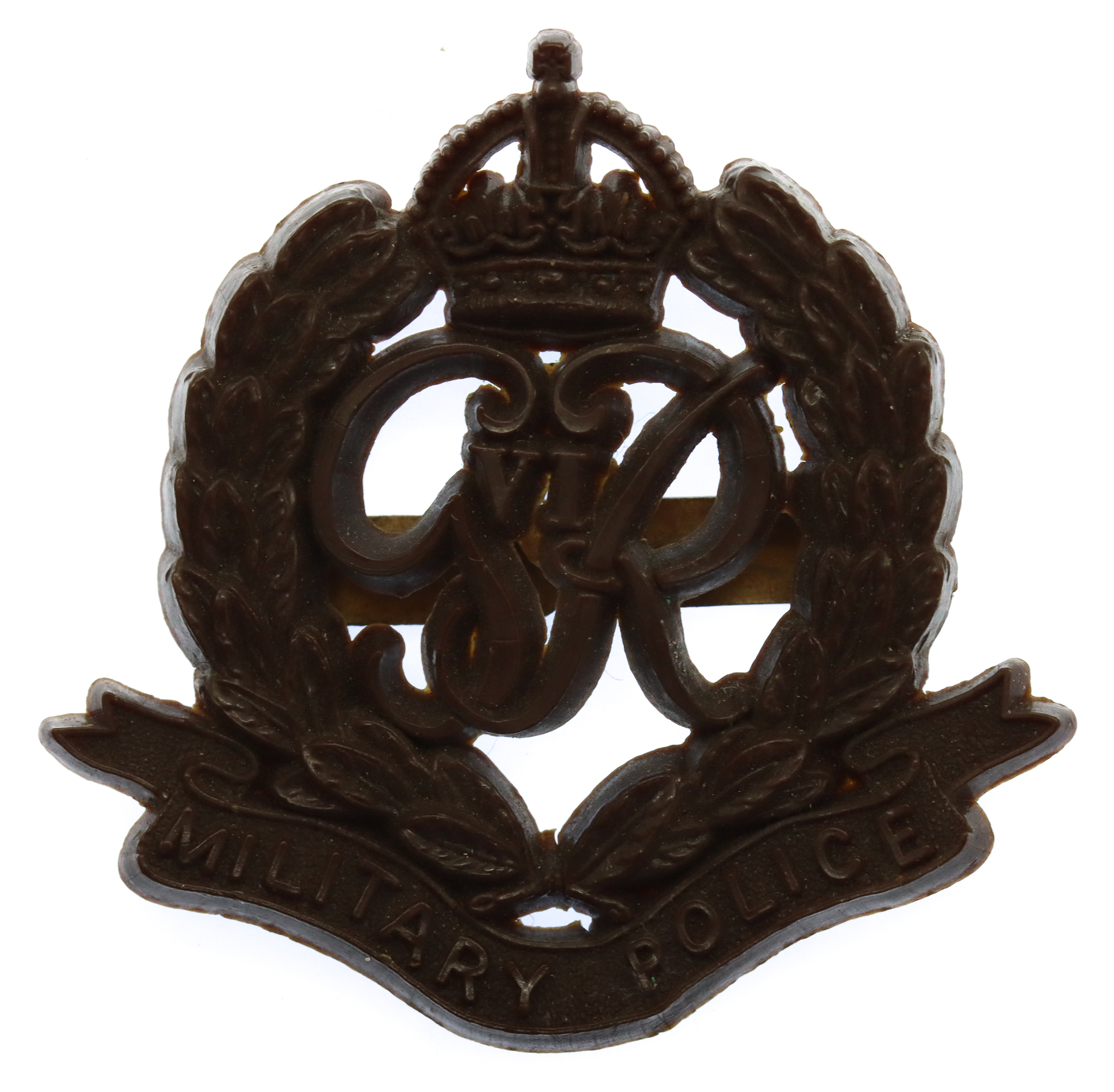 Corps of Military Police WW2  Plastic Economy Cap Badge