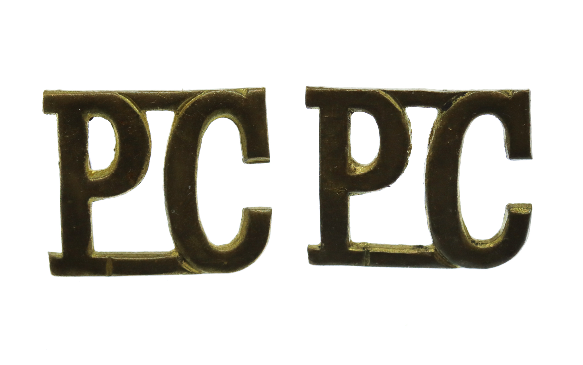 Pair of Pioneer Corps (P.C.) Shoulder Titles