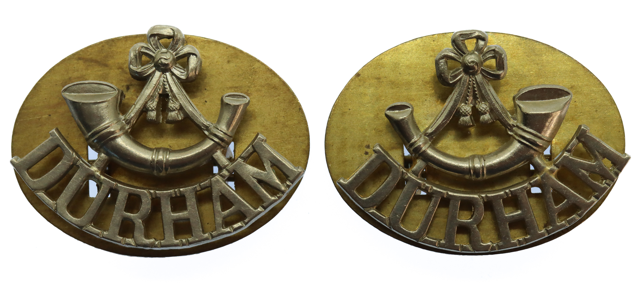 Pair of Durham Light Infantry (Bugle/DURHAM) White Metal Shoulder Titles