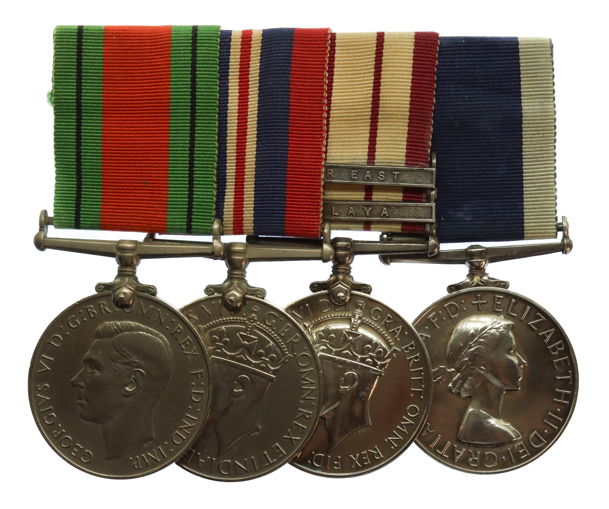 WW2 Defence Medal, War Medal, Naval General Service Medal (Clasps - Malaya, Near East) and RN LS&GC Medal Group of Four - Ldg. Tel. A.C.P. Davis, Royal Navy