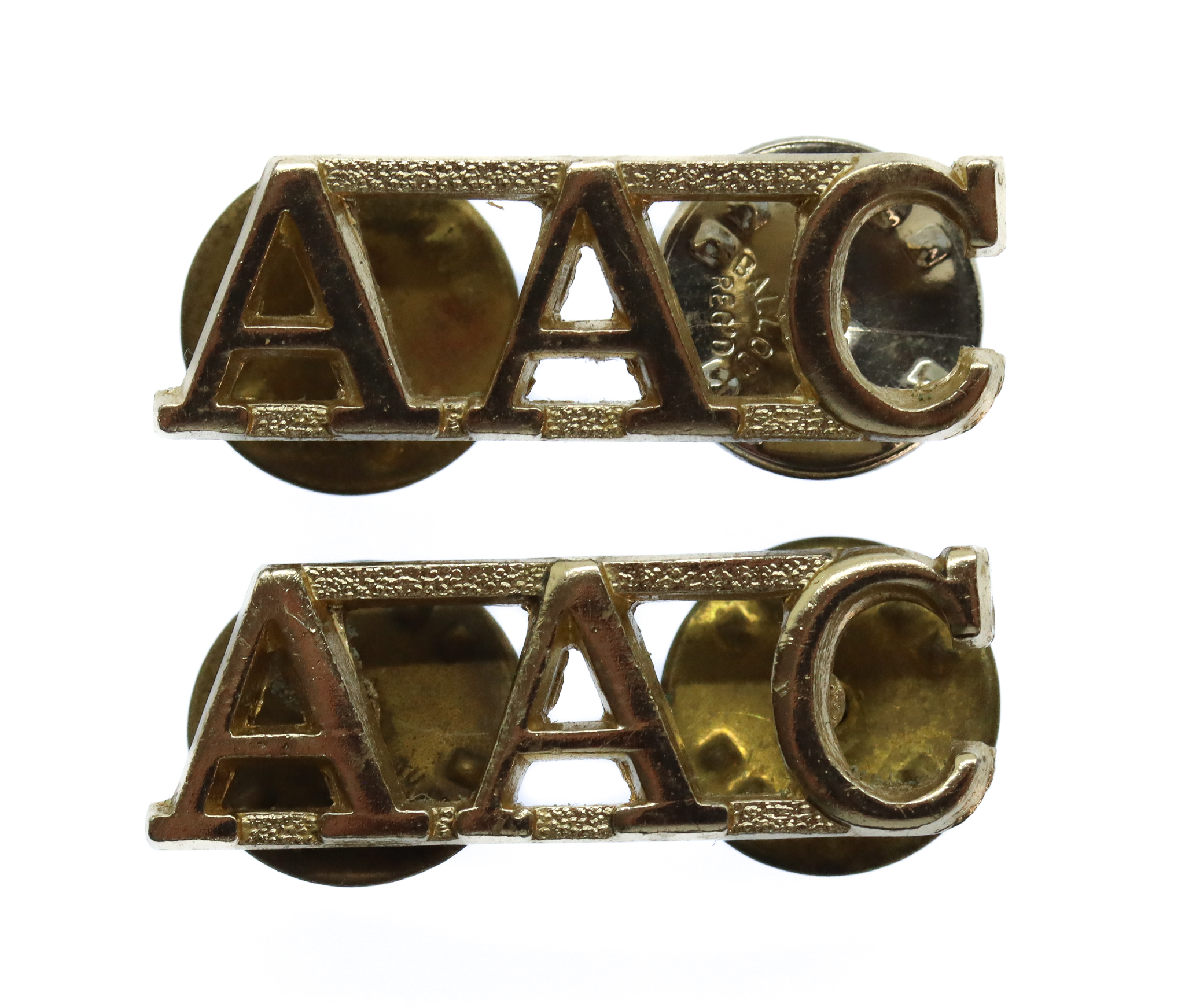 Pair of Army Air Corps (A.A.C.) Anodised (Staybrite) Shoulder Titles