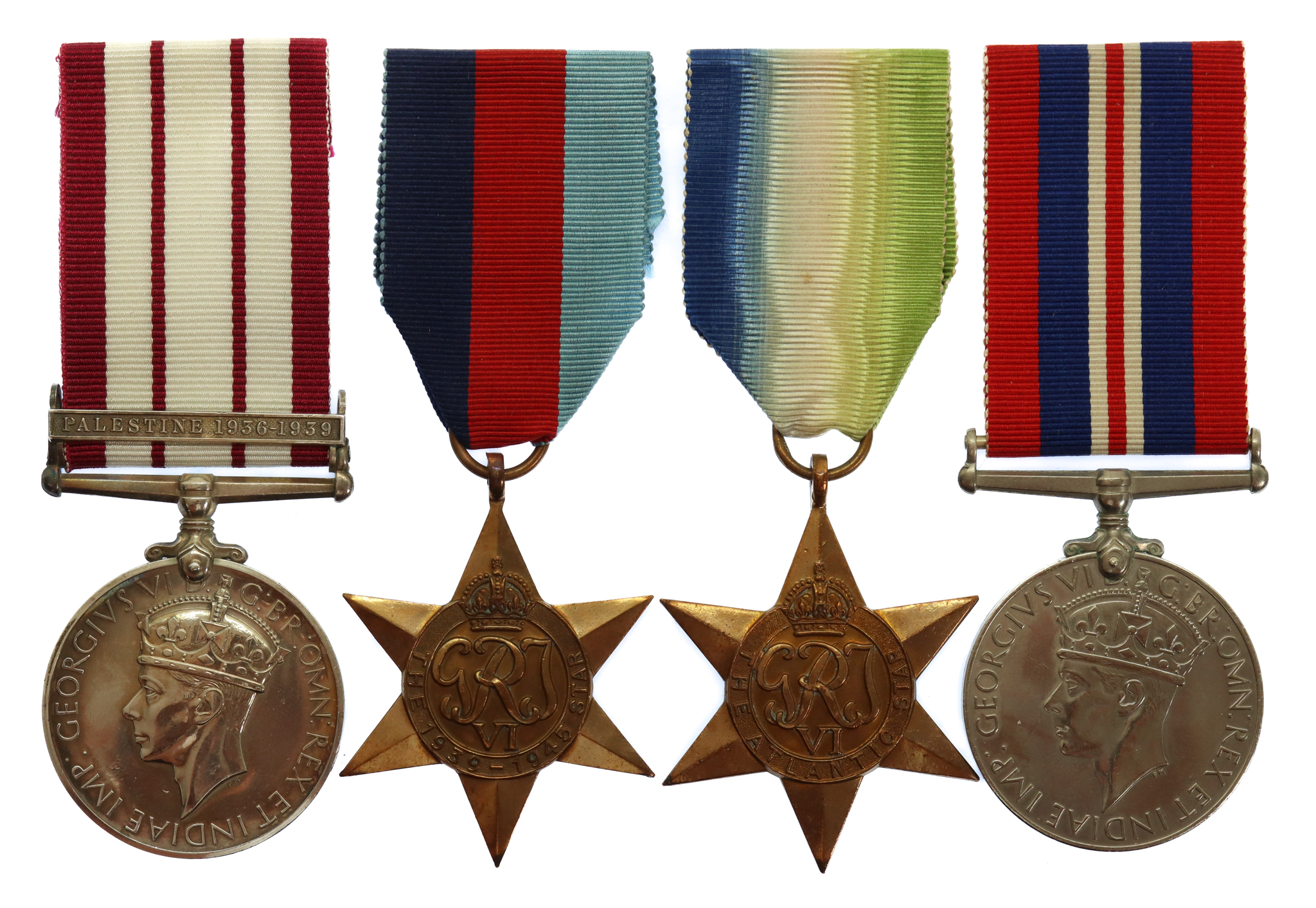 Naval General Service Medal (Clasp - Palestine 1936-1939) and WW2 Medal Group of Four - Canteen Manager L.H. Craddock, NAAFI and Royal Navy