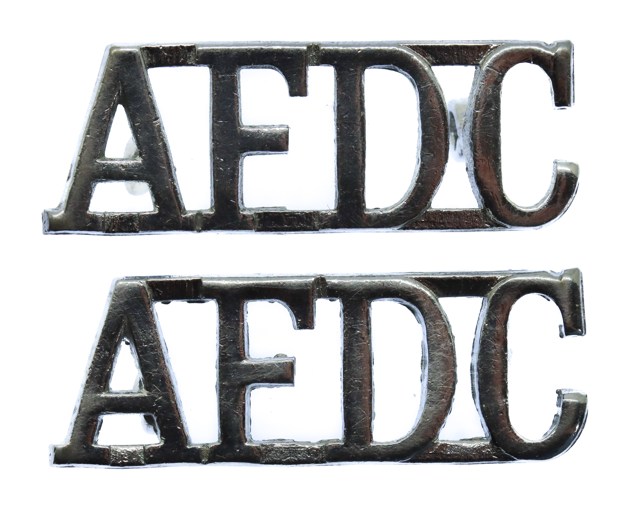 Pair of Air Force Department Constabulary (A.F.D.C.) Chrome Shoulder Titles