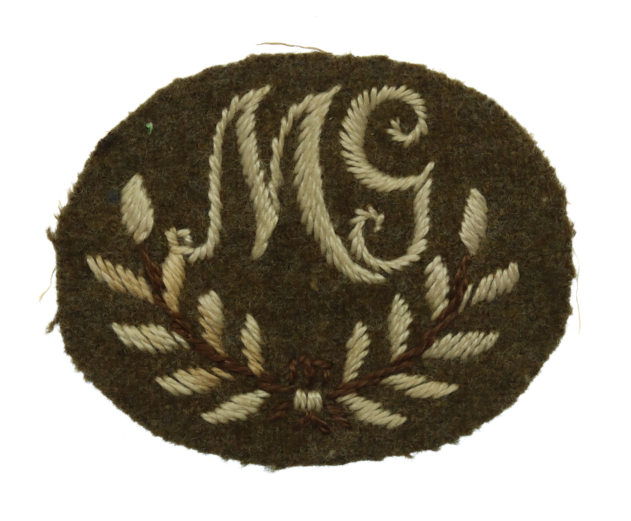 British Army Machine Gunner (M.G.) Cloth Proficiency Arm Badge