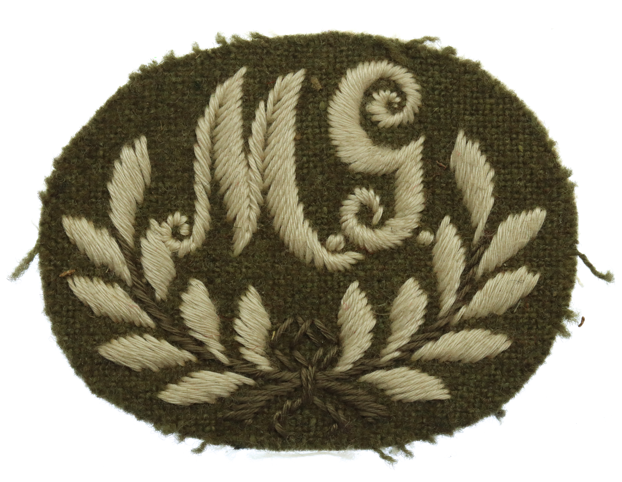British Army Machine Gunner (M.G.) Cloth Proficiency Arm Badge