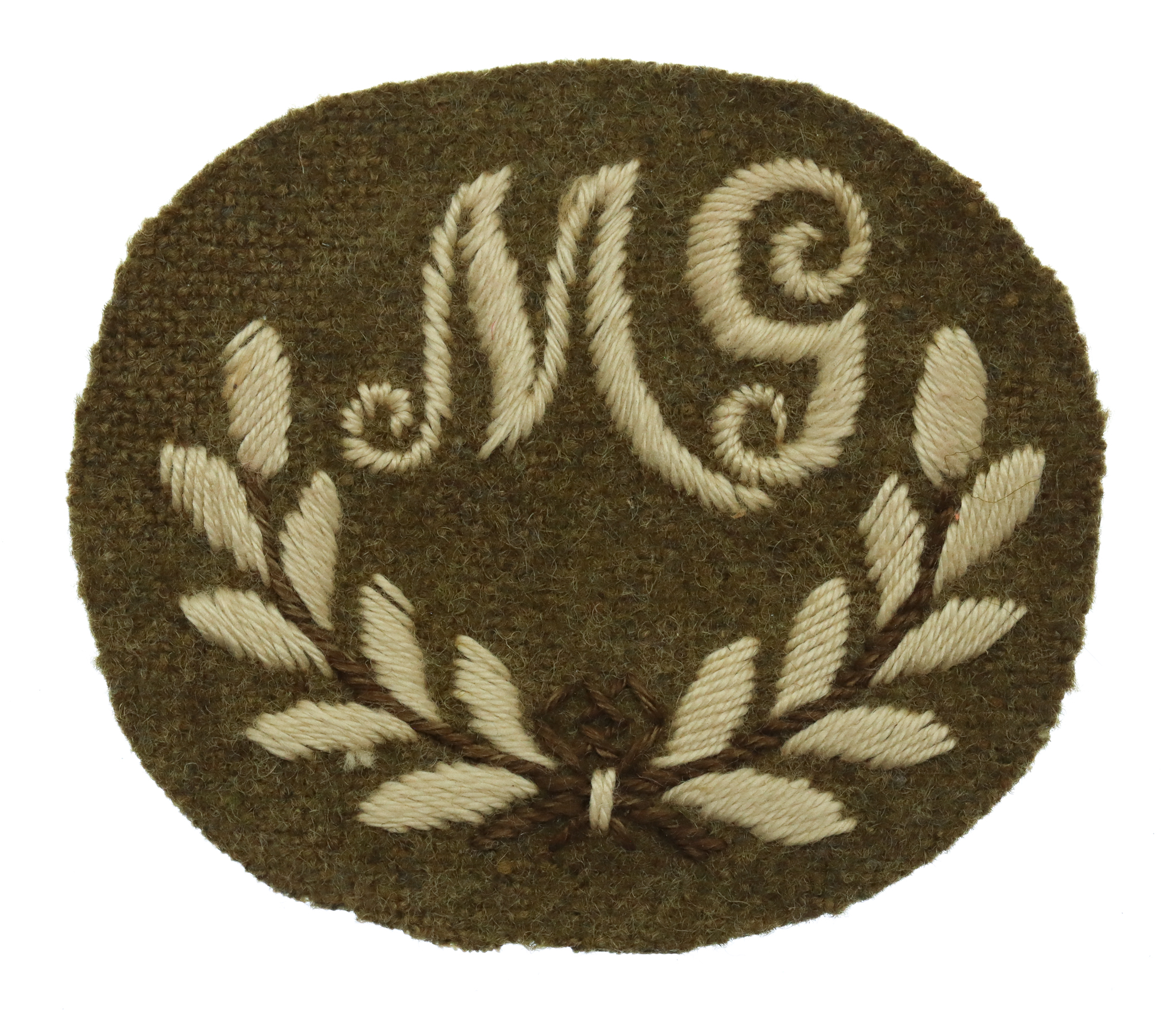 British Army Machine Gunner (M.G.) Cloth Proficiency Arm Badge