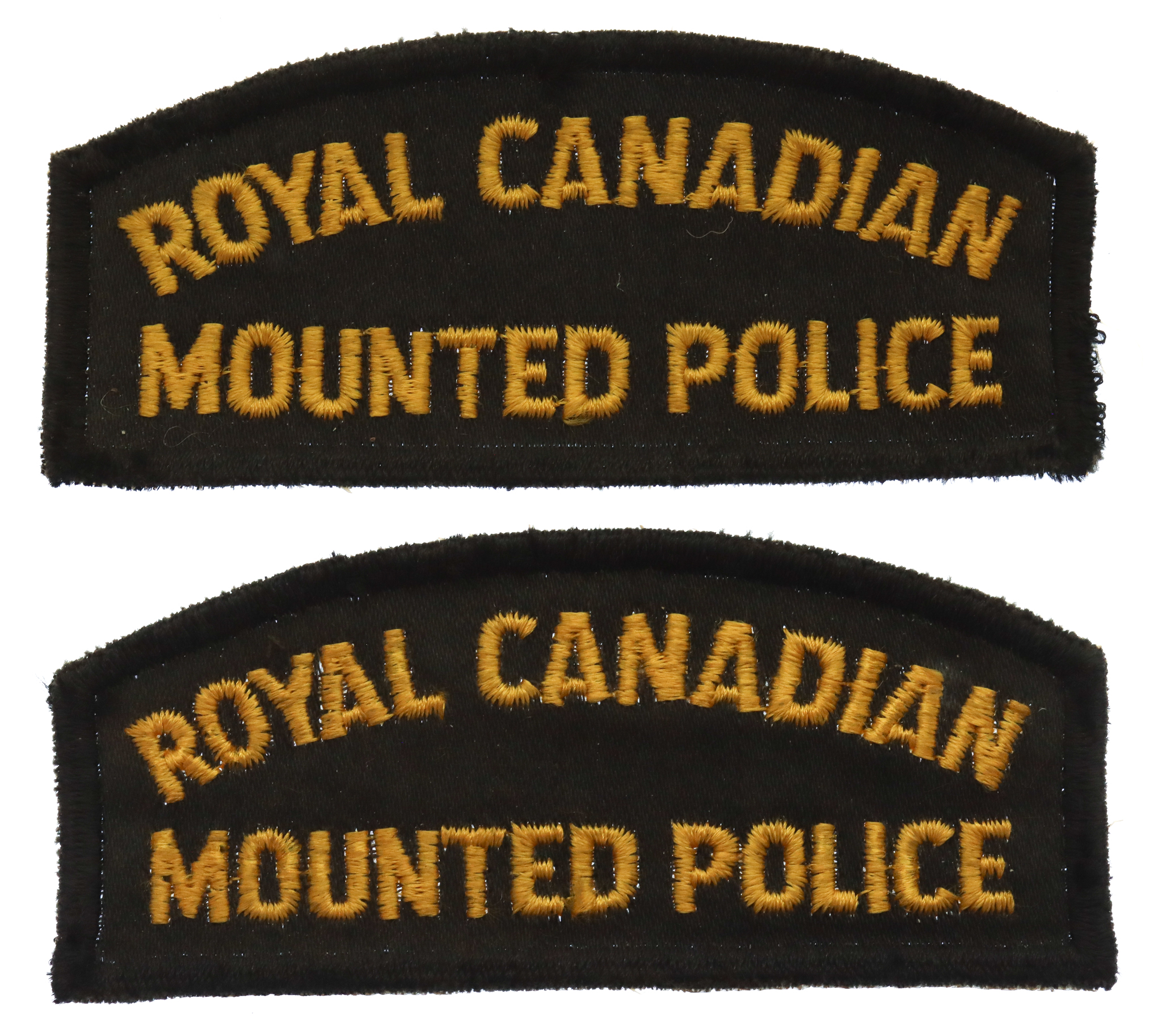 Pair of Royal Canadian Mounted Police (R.C.M.P.) Cloth Shoulder Titles Patches