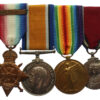 WW1 1914 Mons Star and Bar Medal Trio and 1935 Jubilee Medal Group of Four - Sjt. E.J. Tennant, Royal Horse Artillery - Wounded