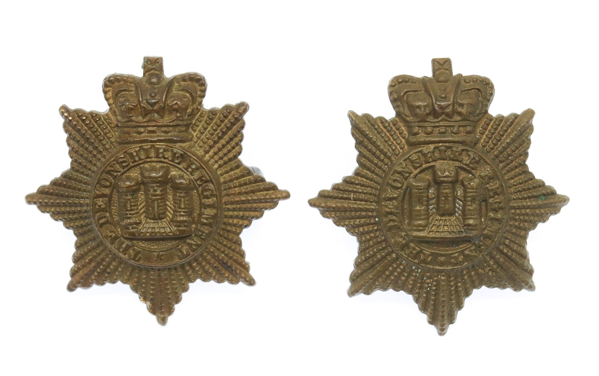 Pair of Victorian Devonshire Regiment Collar Badges