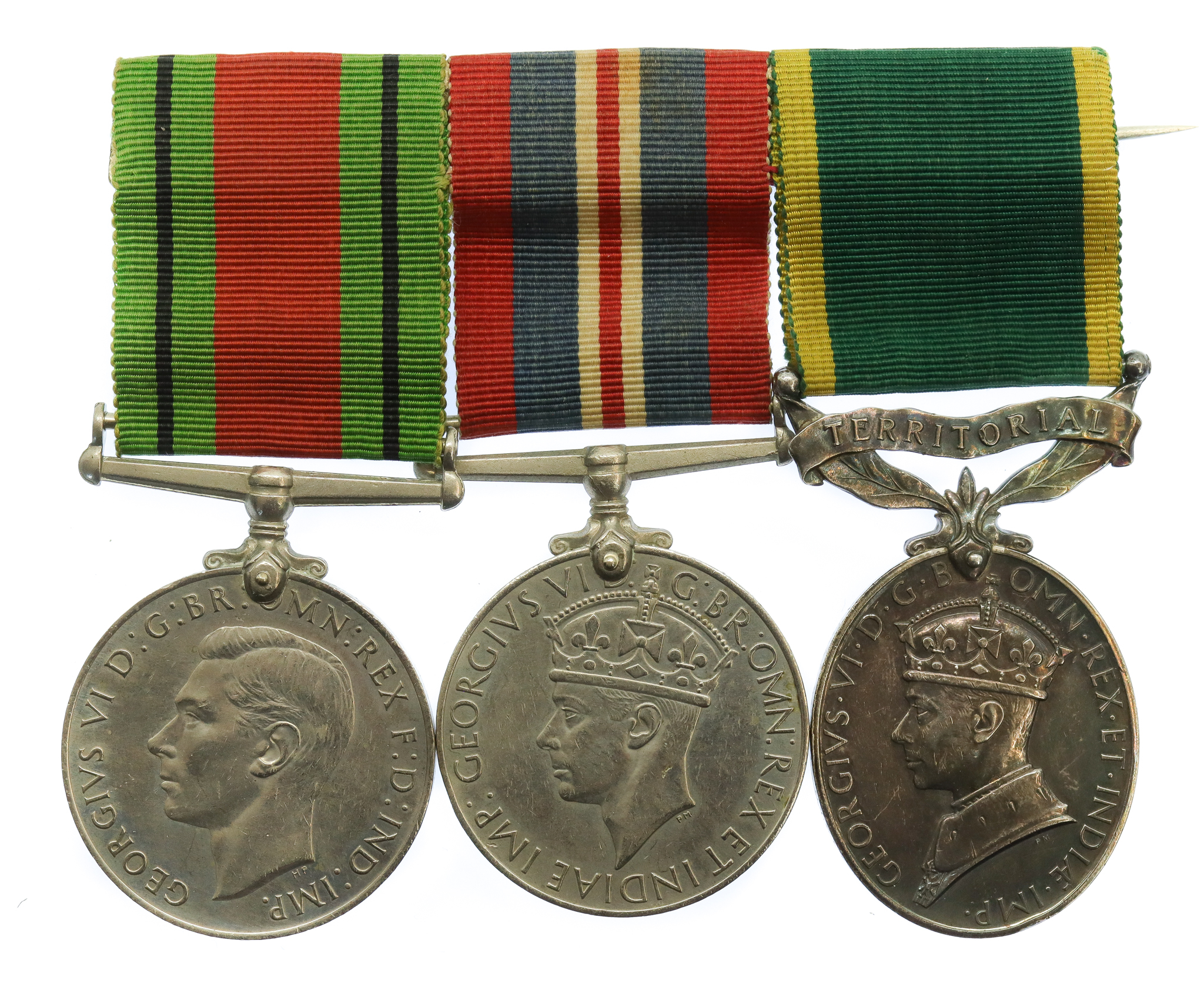 WW2 Defence Medal, War Medal & George VI Territorial Efficiency Medal Group of Three - Sjt. G.A. Brettell, Royal Artillery