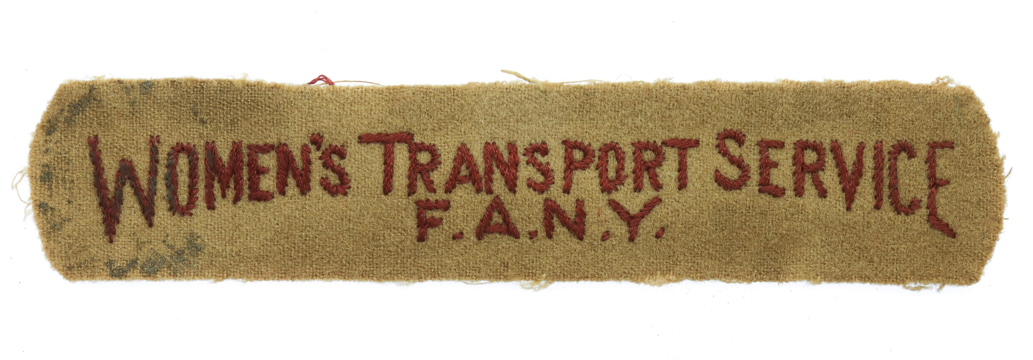 Women's Transport Service First Aid Nursing Yeomanry (WOMEN'S TRANSPORT SERVICE/F.A.N.Y.) Cloth Shoulder Title