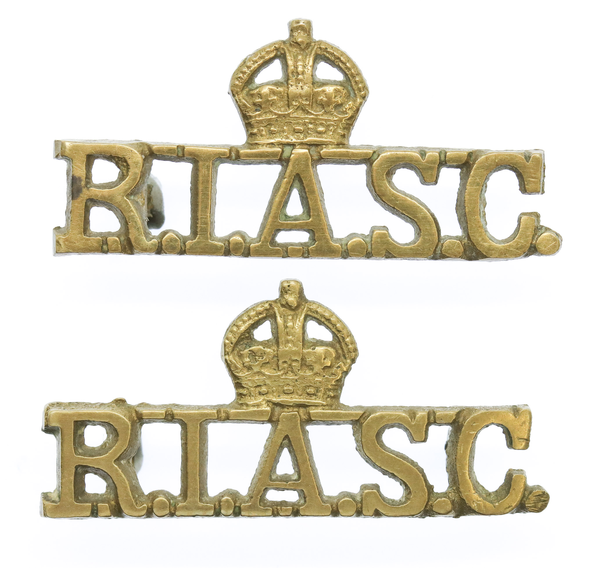 Pair of Royal Indian Army Service Corps (R.I.A.S.C.) Shoulder Titles