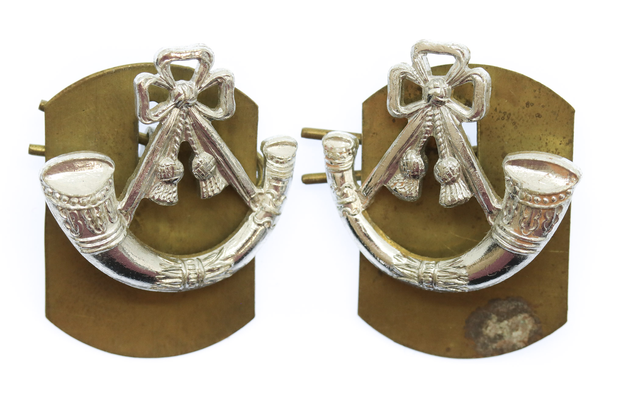 Pair of Light Infantry Anodised ( Staybrite) Collar Badges