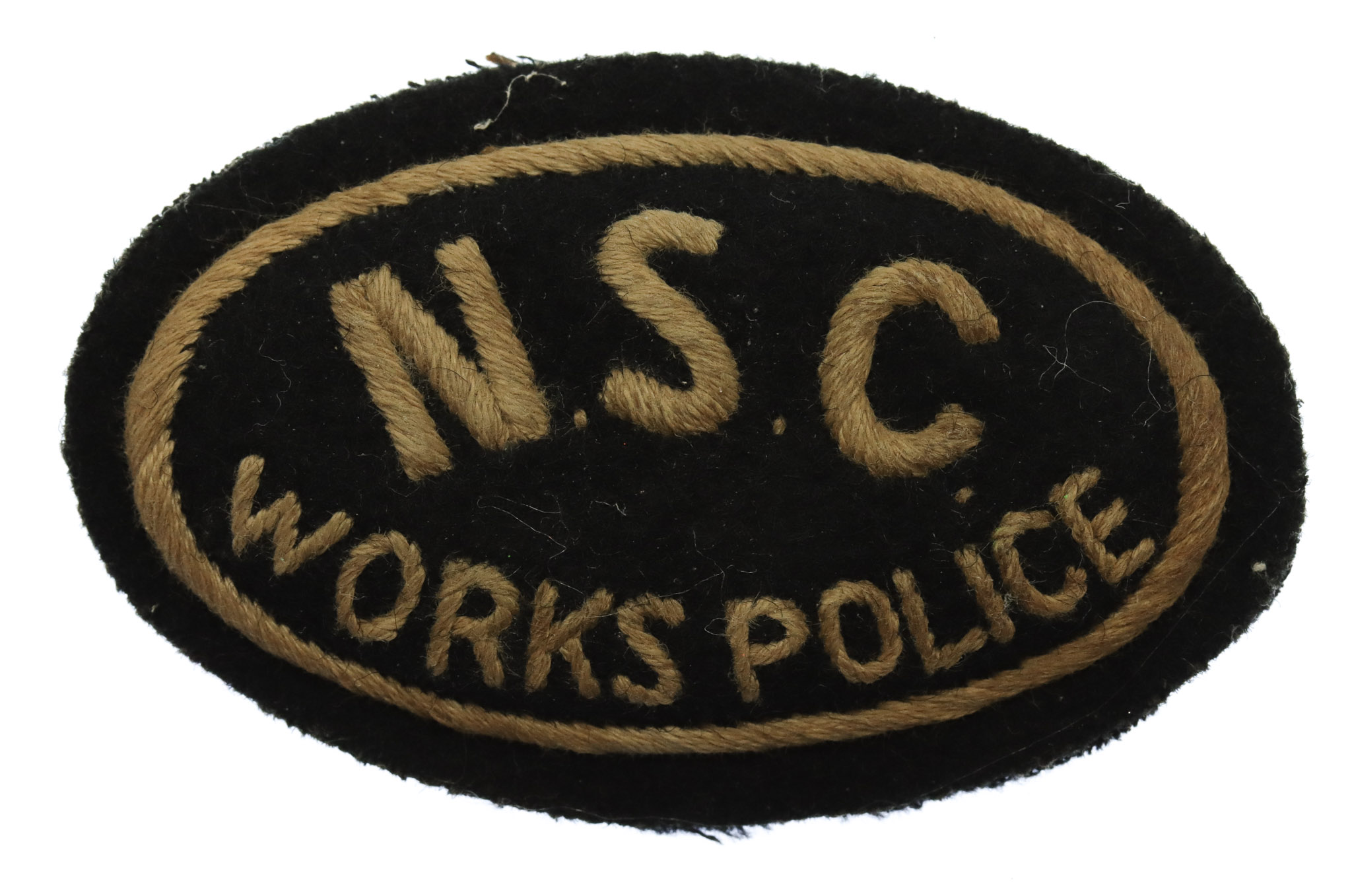 Newman Industries Ltd N.S.C. Works Police Cloth Cap Badge