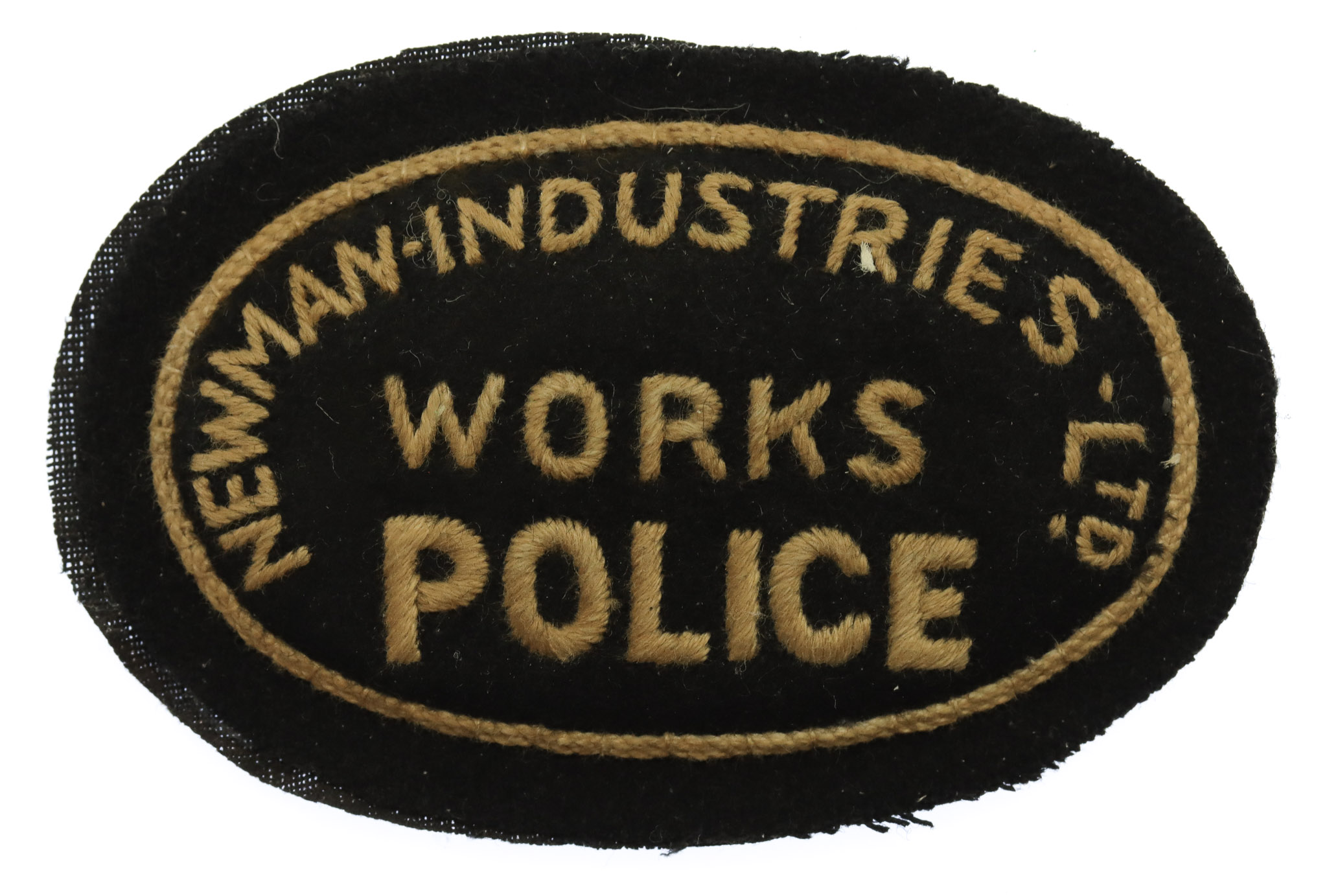 Newman Industries Ltd Works Police Cloth Cap Badge