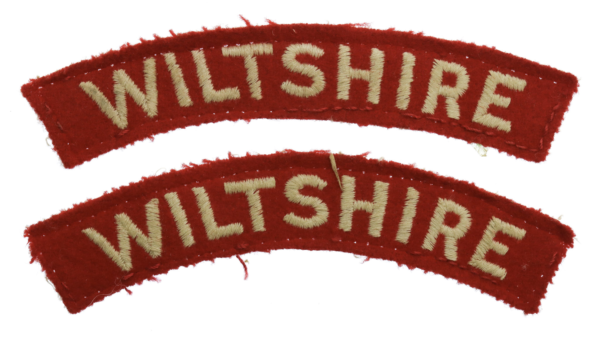 Pair of Wiltshire Regiment Cloth Shoulder Titles