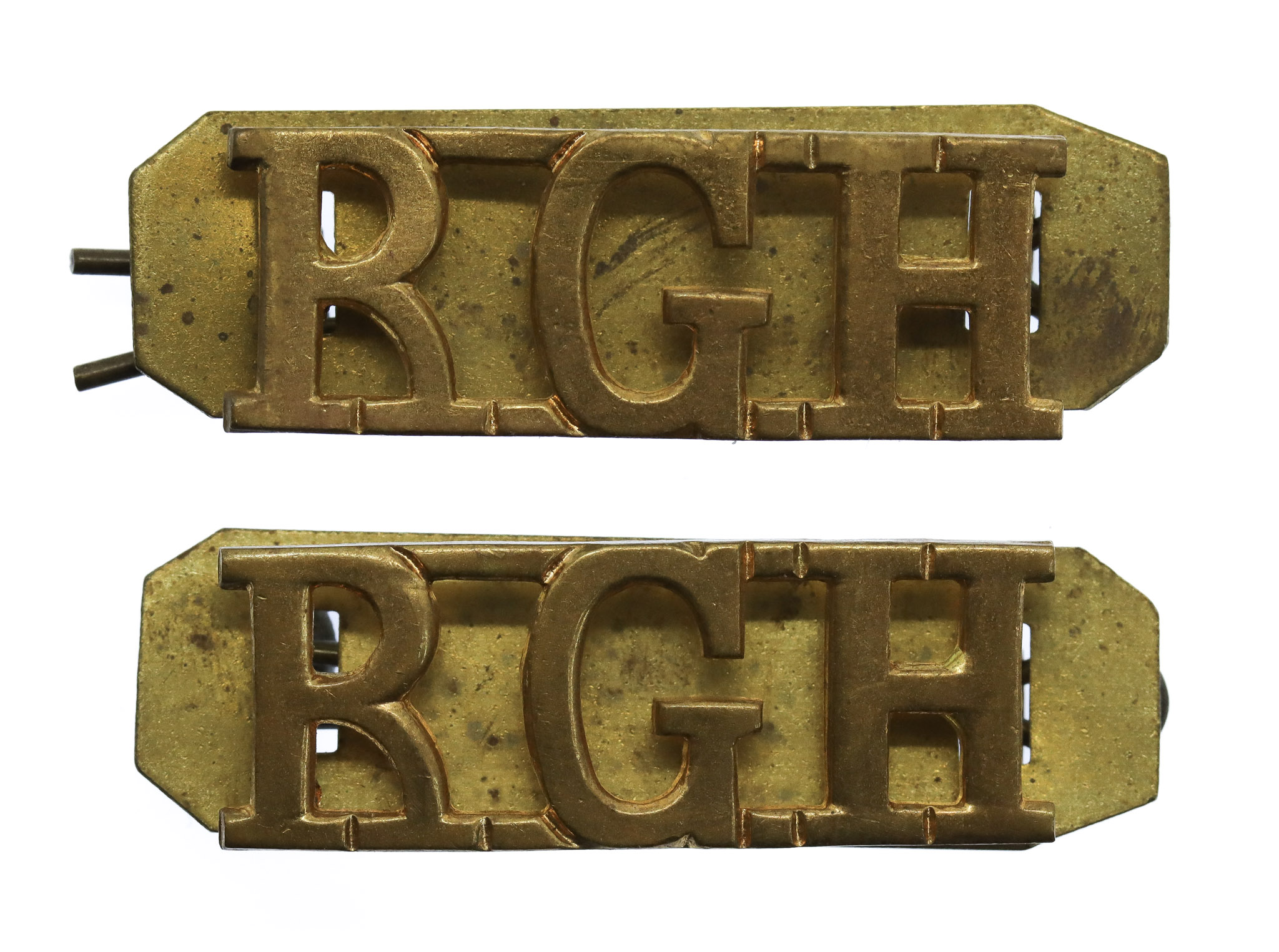 Pair of Royal Gloucestershire Hussars ( R.G.H.) Shoulder Titles
