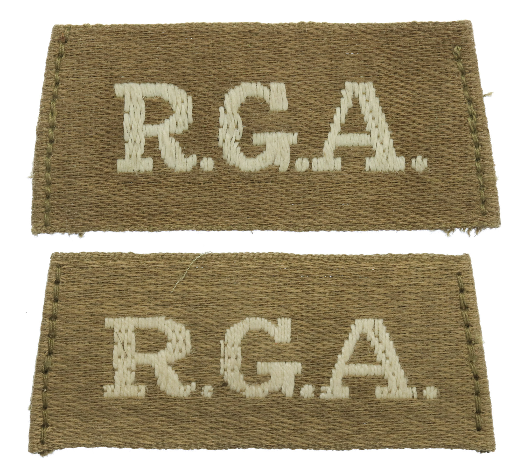 Pair of Royal Garrison Artillery (R.G.A.) WW1 Cloth Slip On Shoulder Titles