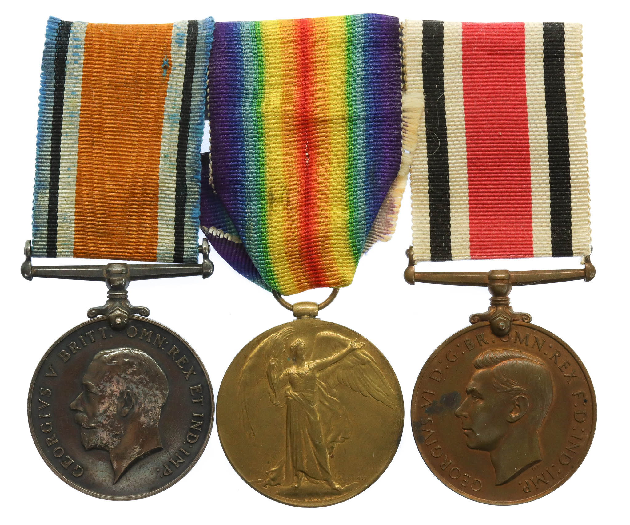 WW1 British War Medal, Victory Medal and George V Special Constabulary Long Service Medal Group of Three - Gnr. A.E. Dinham, Royal Artillery