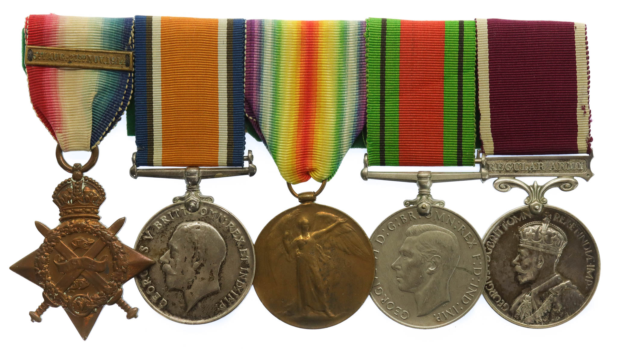 WW1 1914 Mons Star, British War Medal, Victory Medal, WW2 Defence Medal and LS&GC Medal Group of Five - Bmbr. W. Leslie, Royal Artillery and Corps of Military Police