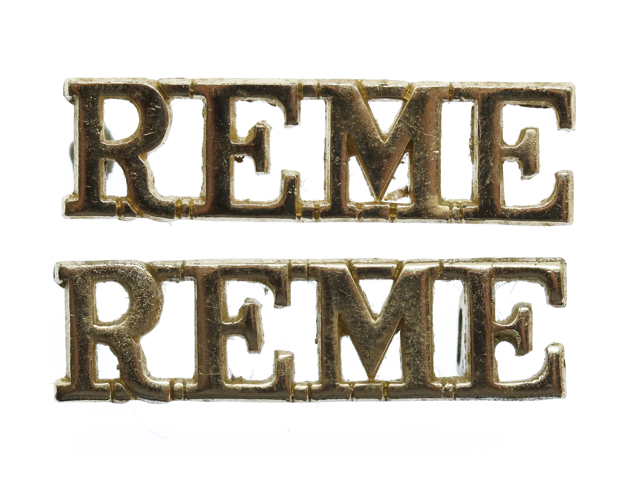 Pair of Royal Electrical & Mechanical Engineers (R.E.M.E.) Anodised (Staybrite) Shoulder Titles
