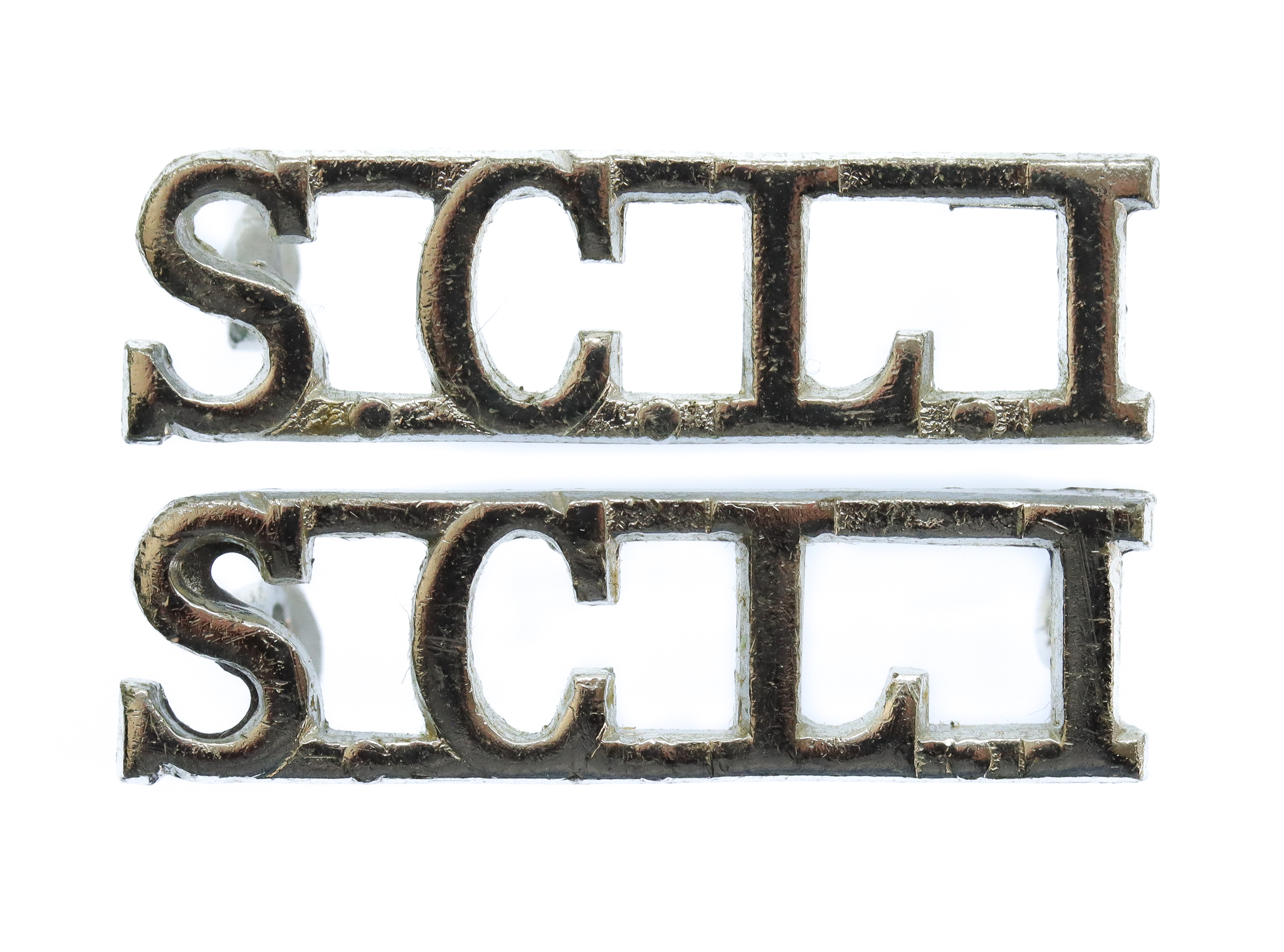 Pair of Somerset & Cornwall Light Infantry (SCLI) Anodised (Staybrite) Shoulder Titles