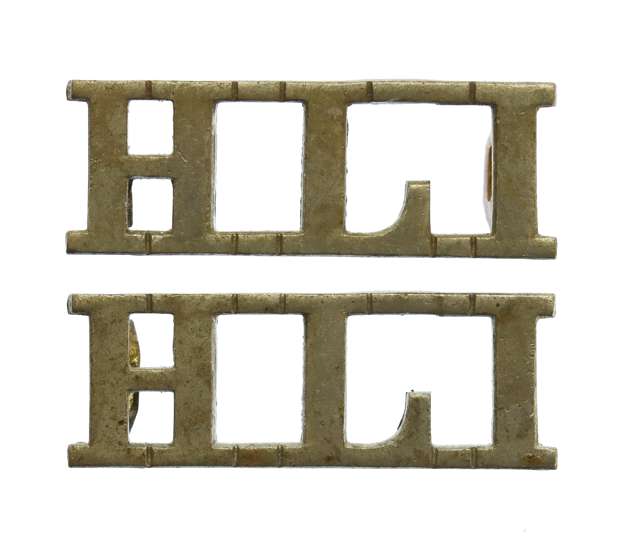 Pair of Highland Light Infantry (H.L.I.) White Metal Shoulder Titles