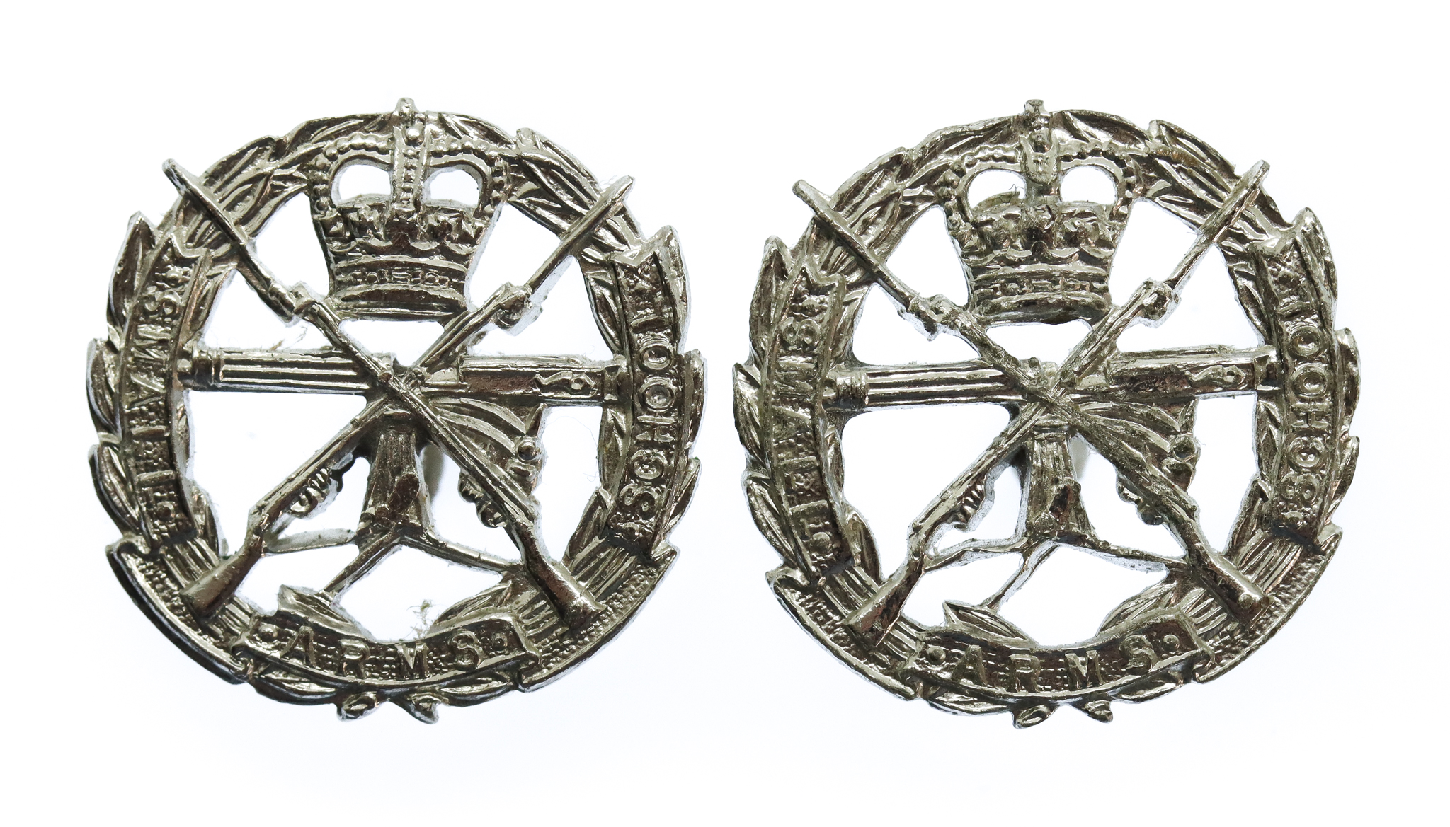 Pair of Small Arms School Corps Anodised (Staybrite) Collar Badges