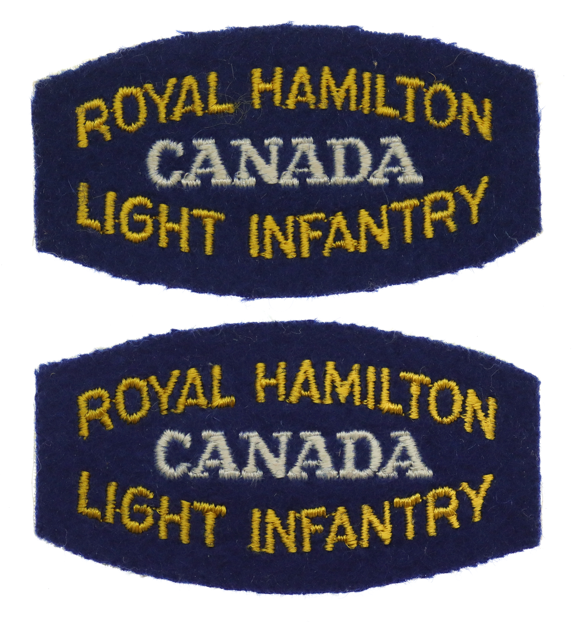 Pair of Canadian Royal Hamilton Light Infantry (ROYAL HAMILTON/CANADA/LIGHT INFANTRY) Cloth Shoulder Titles
