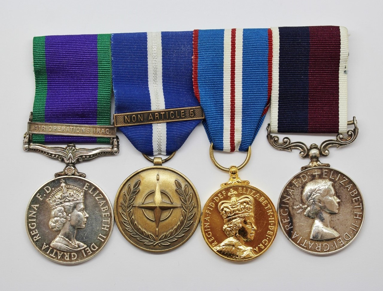Campaign Service Medal (Clasp - Air Operations Iraq), NATO (Non Article 5), 2002 Golden Jubilee and RAF Long Service & Good Conduct Medal Group of Four - Sgt. A.C. Hutchinson, Royal Air Force