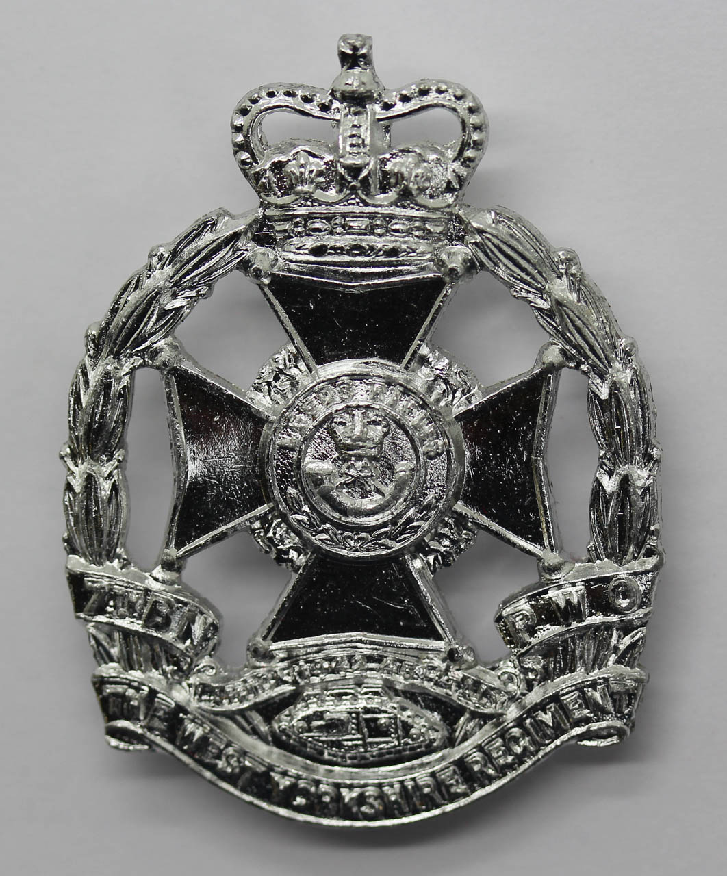 7th Bn. P.W.O. West Yorkshire Regiment (Leeds Rifles) Anodised (Staybrite) Cap Badge - With Tank