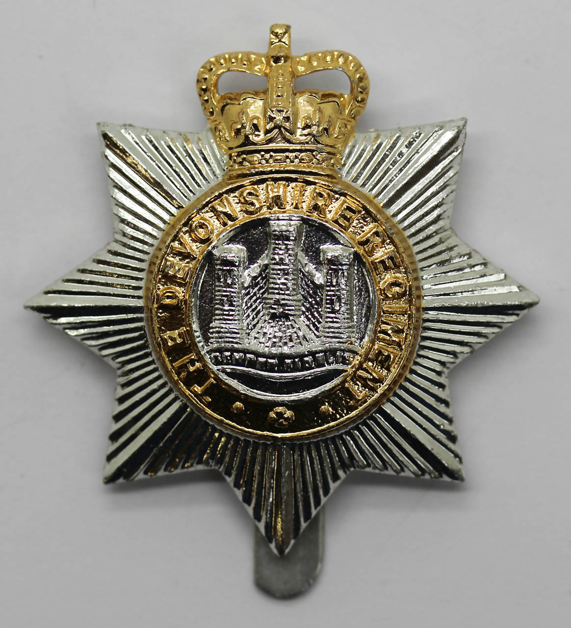Devonshire Regiment Anodised (Staybrite) Cap Badge - Queen's Crown
