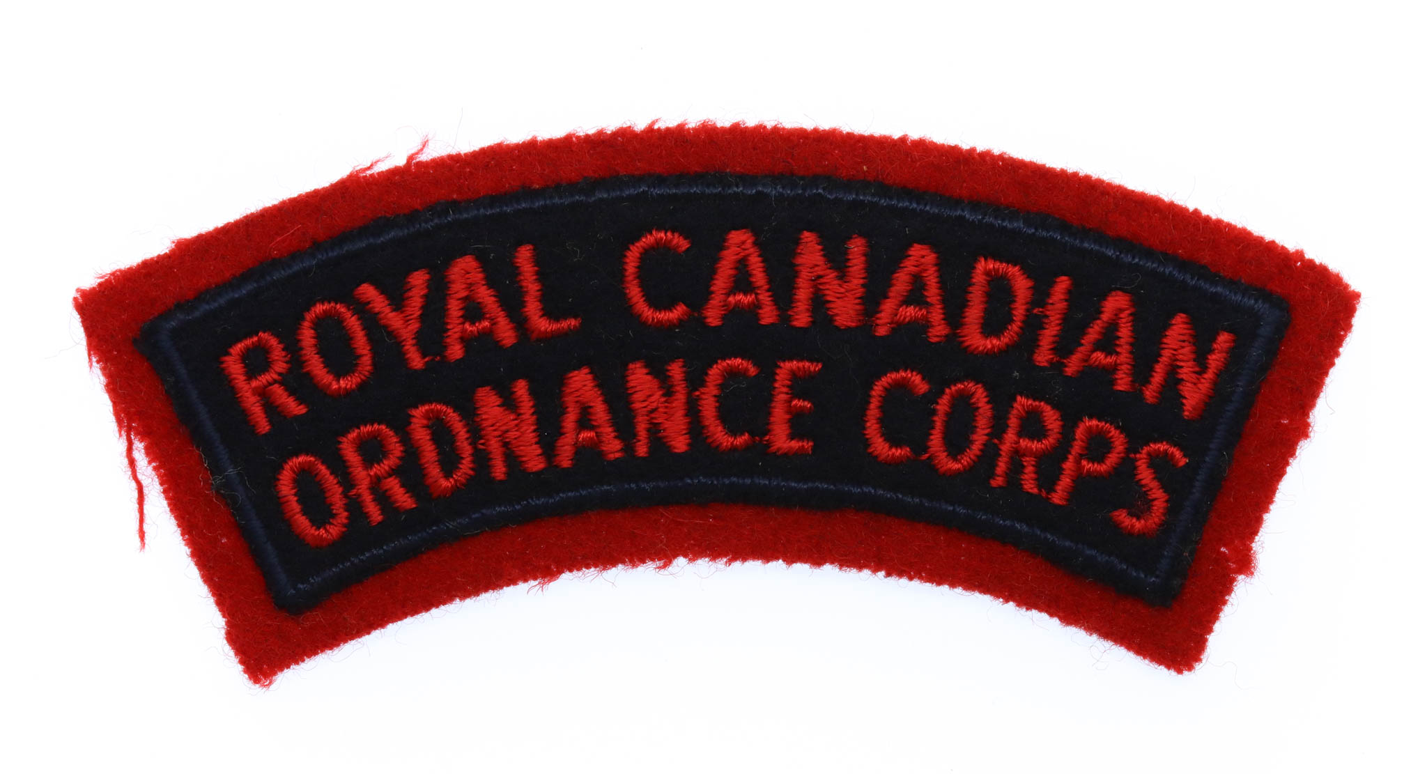 Royal Canadian Ordnance Corps (ROYAL CANADIAN / ORDNANCE CORPS) Cloth Shoulder Title