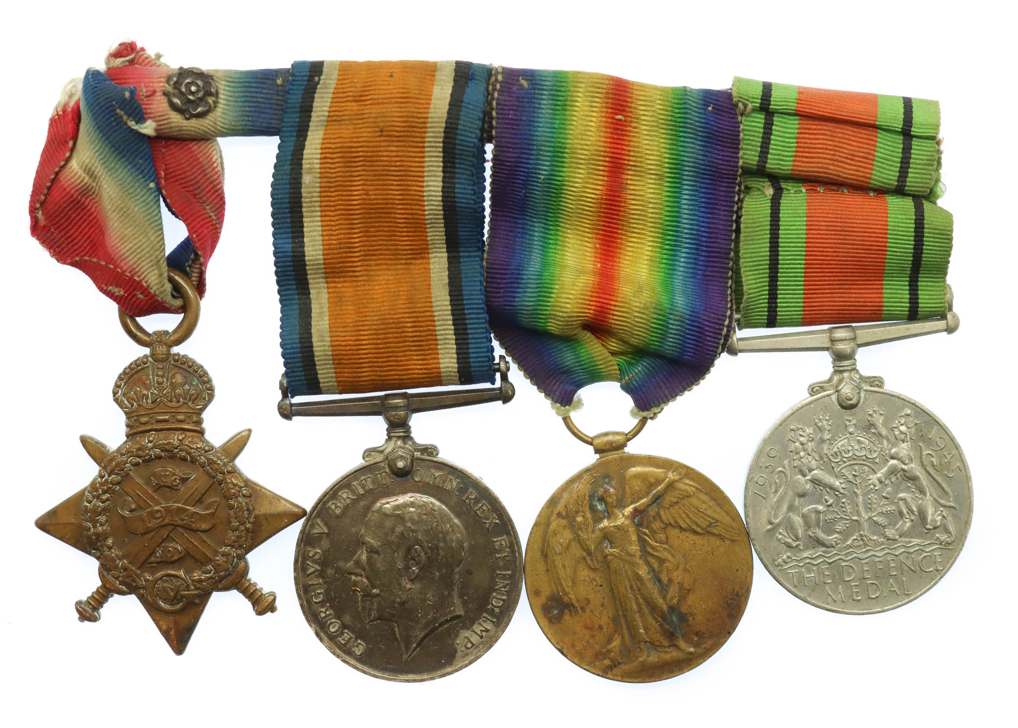 WW1 1914 Mons Star Medal Trio and WW2 Defence Medal Group of Four - Pte. R. Sturtevant, 2nd Bn. Royal Scots Fusiliers - Wounded in Action