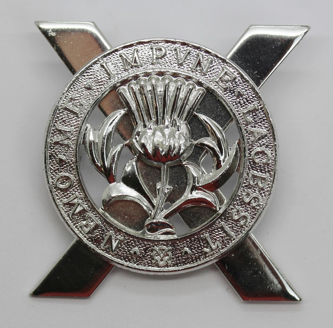 Lowland Brigade Anodised (Staybrite) Cap Badge