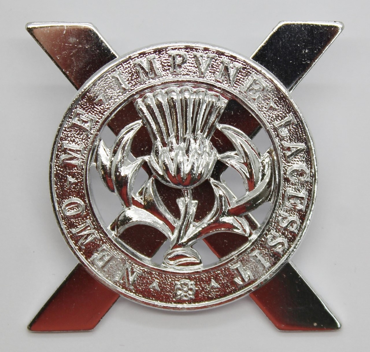 Lowland Brigade Anodised (Staybrite) Cap Badge