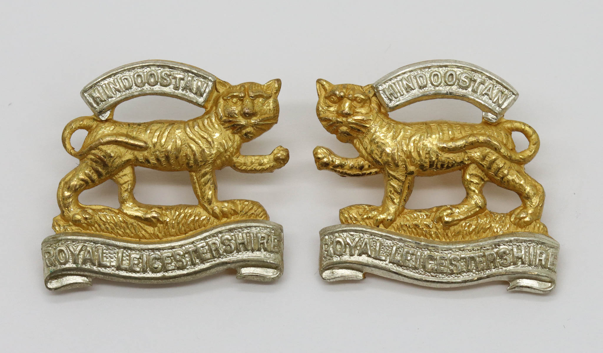 Pair of Royal Leicestershire Regiment Officer's Collar Badges