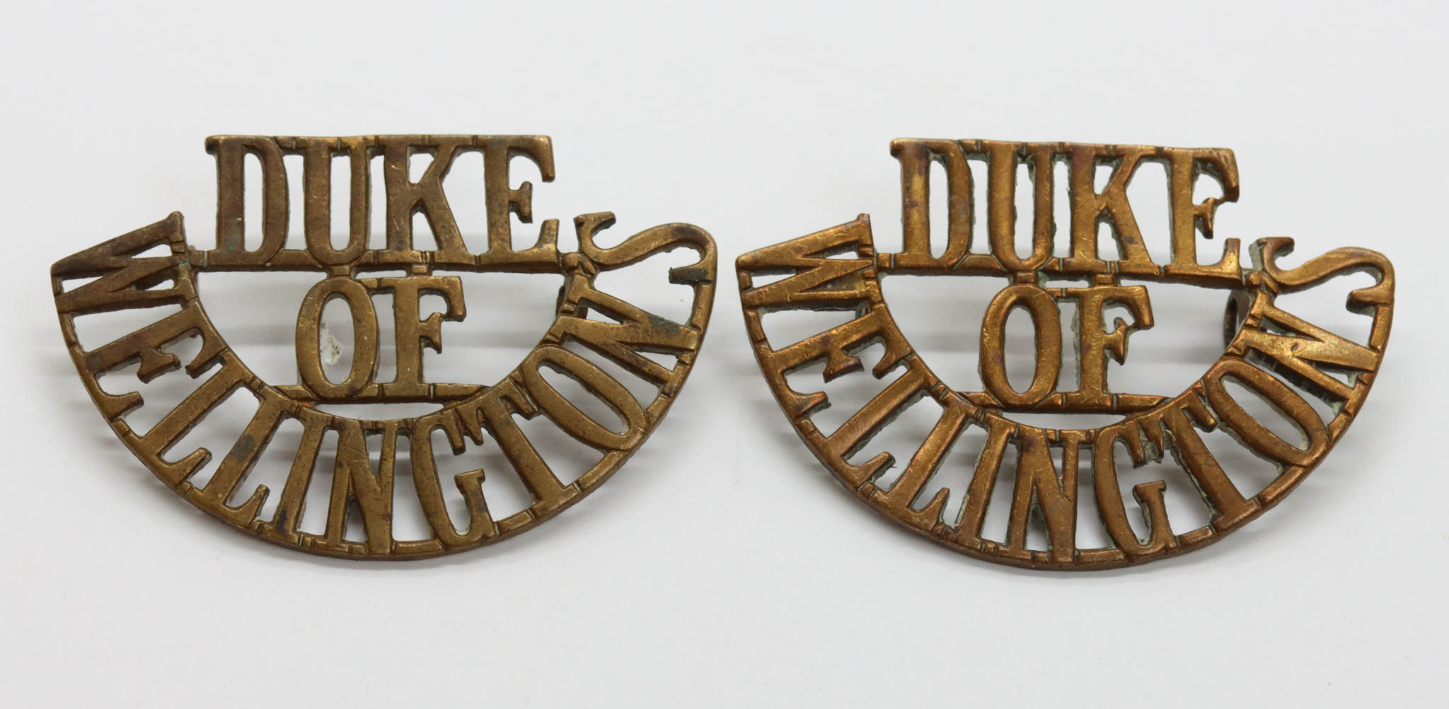 Pair of West Riding Regiment (DUKE/OF/WELLINGTON'S) Shoulder Titles