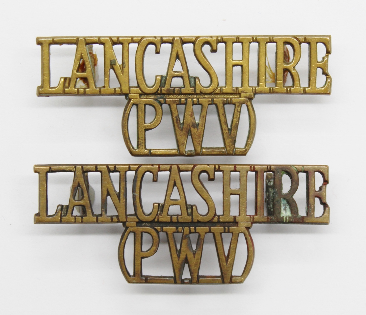Pair of Lancashire Regiment (LANCASHIRE/PWV) Shoulder Titles