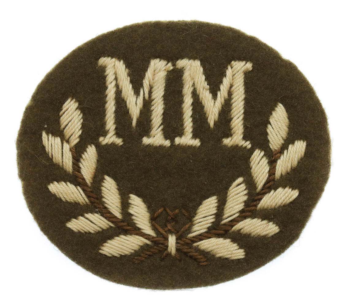 British Army Mortar Man (M.M.) Cloth Proficiency Arm Badge